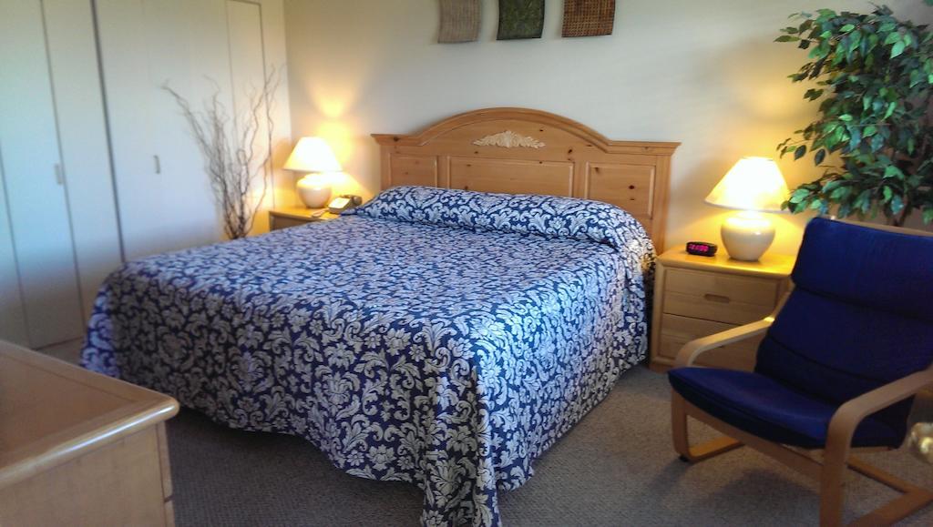 Hotel Montauk Manor Chambre photo A bed with a duvet